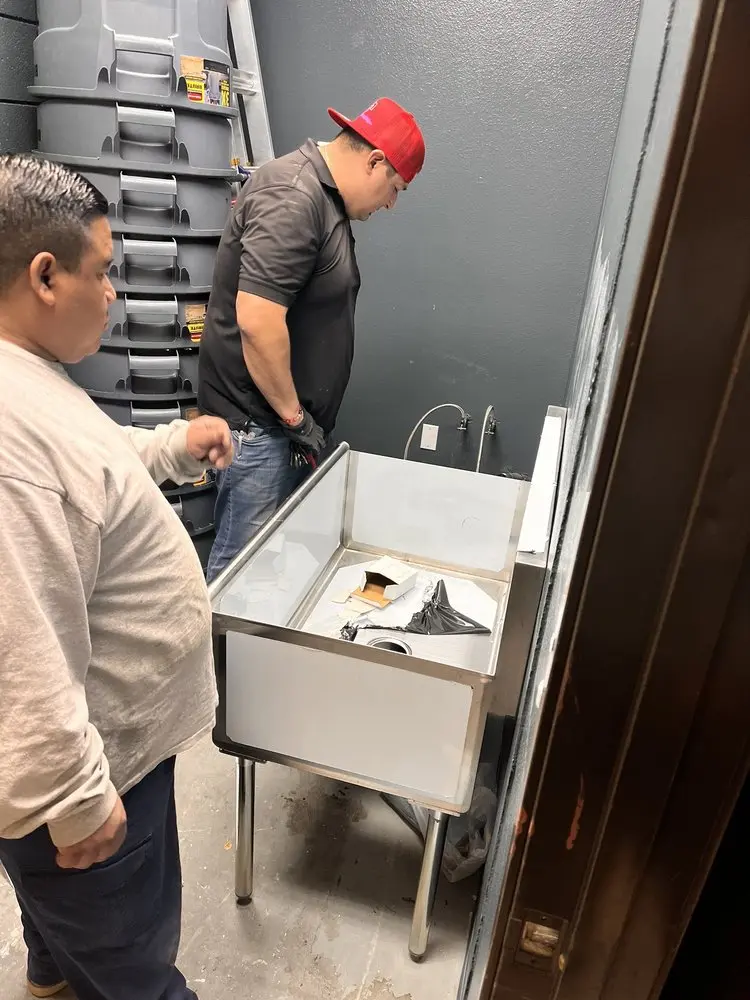 Commercial plumbing and sink installation in Layton